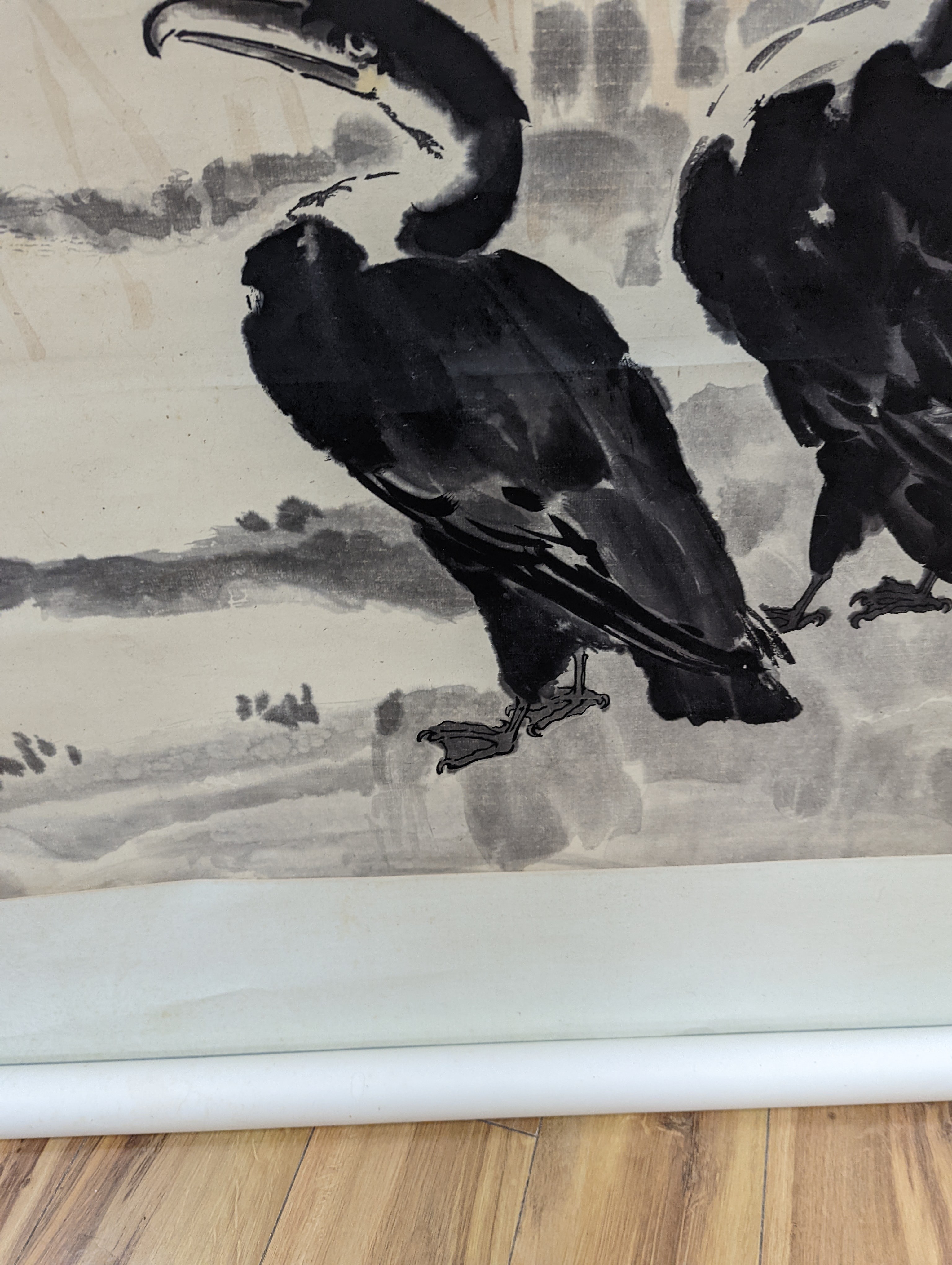 Two mid 20th century Japanese watercolour on paper scroll paintings, Boatman in a landscape, 79.5 x 113cm, and Cormorants on a bank, 103 x 106cm
